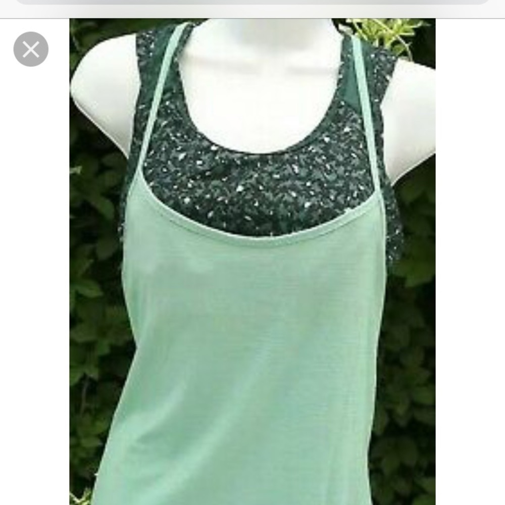Green patterned tank top with built in sports bra.